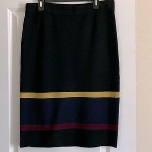 Cute color block modern sweater skirt, size L. Excellent used condition.